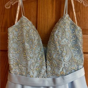 Beautiful light blue formal dress. Brand is splash. Size 10.